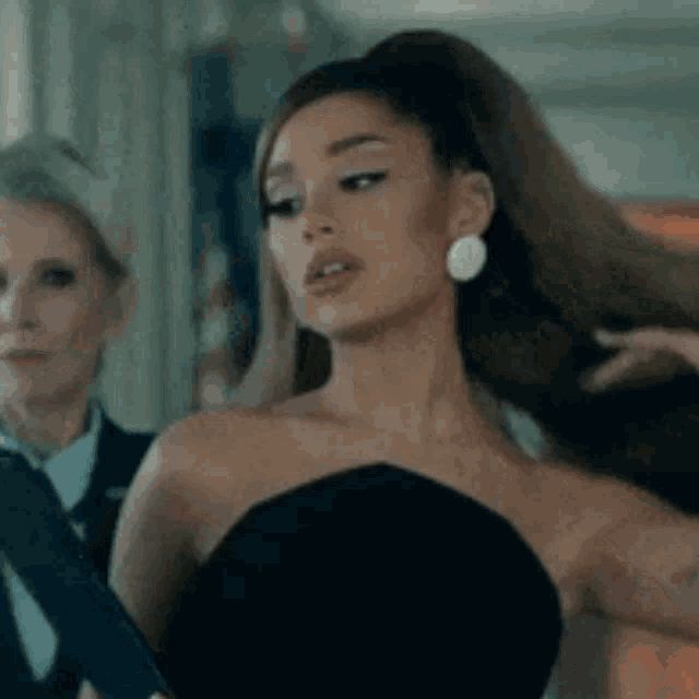 Ariana Grande Hair Flip GIF