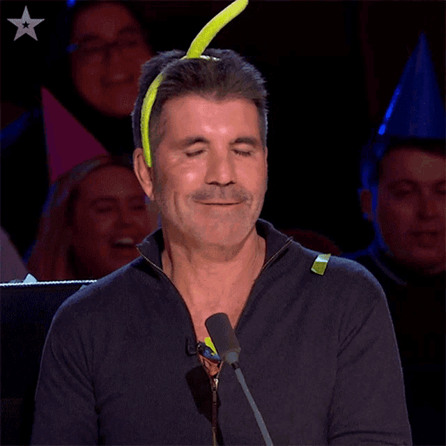 Frowning Simon Cowell GIF