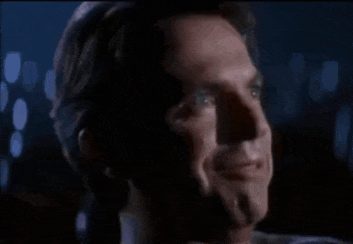 In The Mouth Of Madness Sam Neill GIF