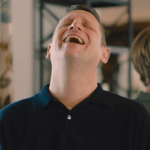 Laughing Tim Robinson GIF