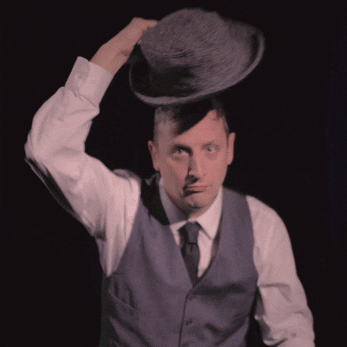 Putting On A Hat Tim Robinson GIF