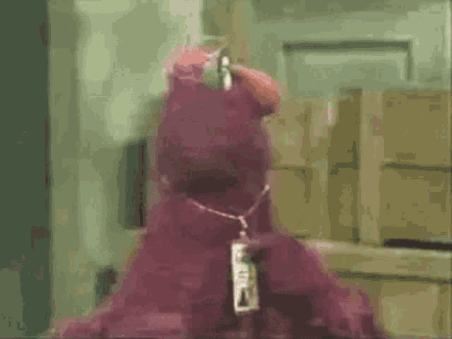 Telly Monster Faint GIF