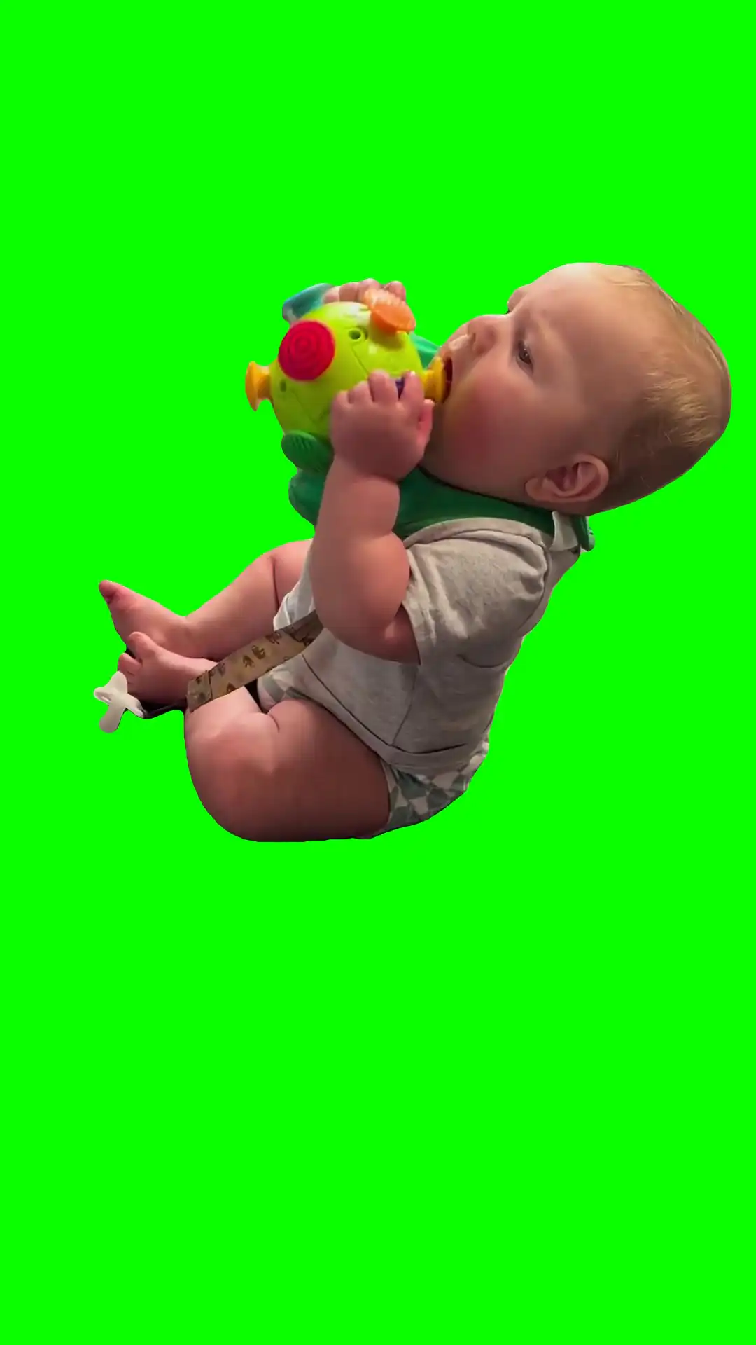Baby playing with shaking toy meme green screen