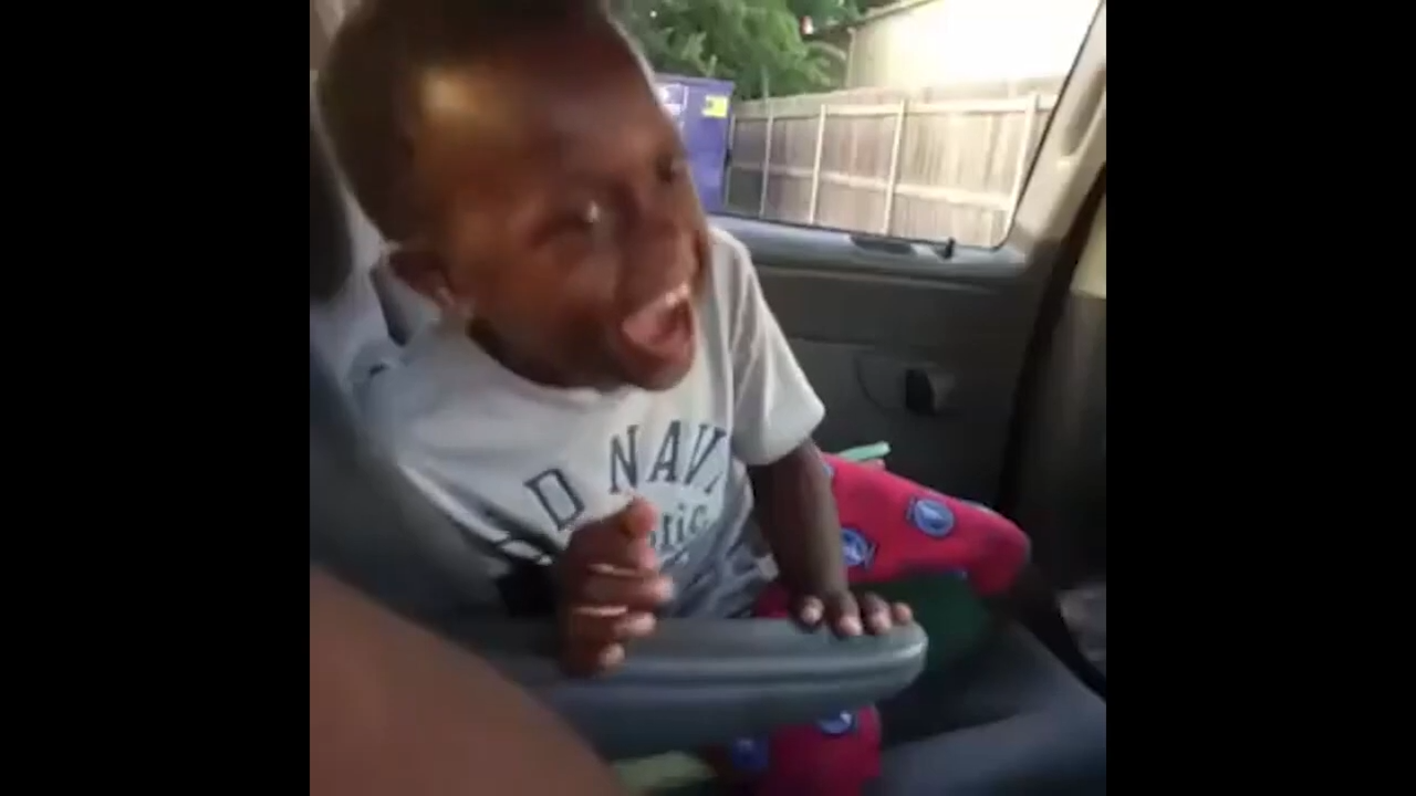 Black Kid Laughing In a Car Meme Video