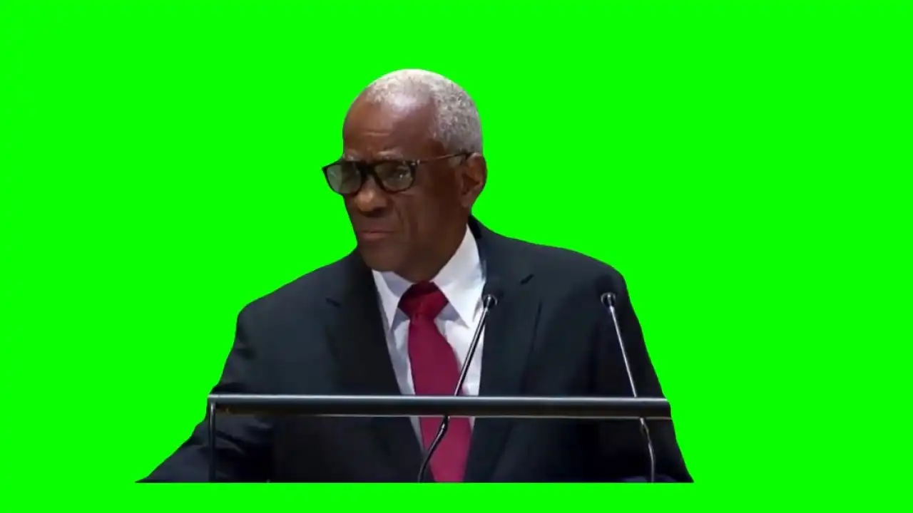 Haitian politician drinks from pitcher green screen