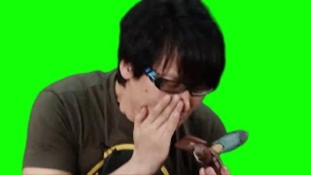 Hideo Kojima sniffing Metal Gear RAY green screen