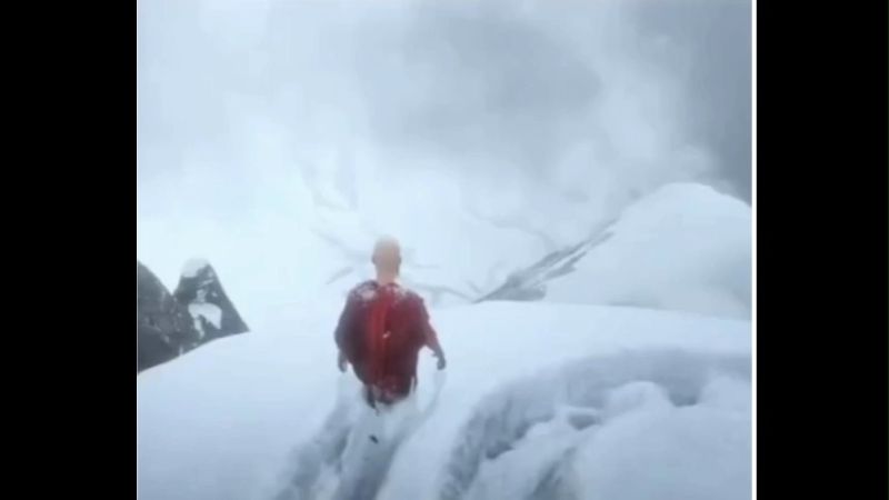 Man in red tshirt walking in snow trending game Instagram Memes
