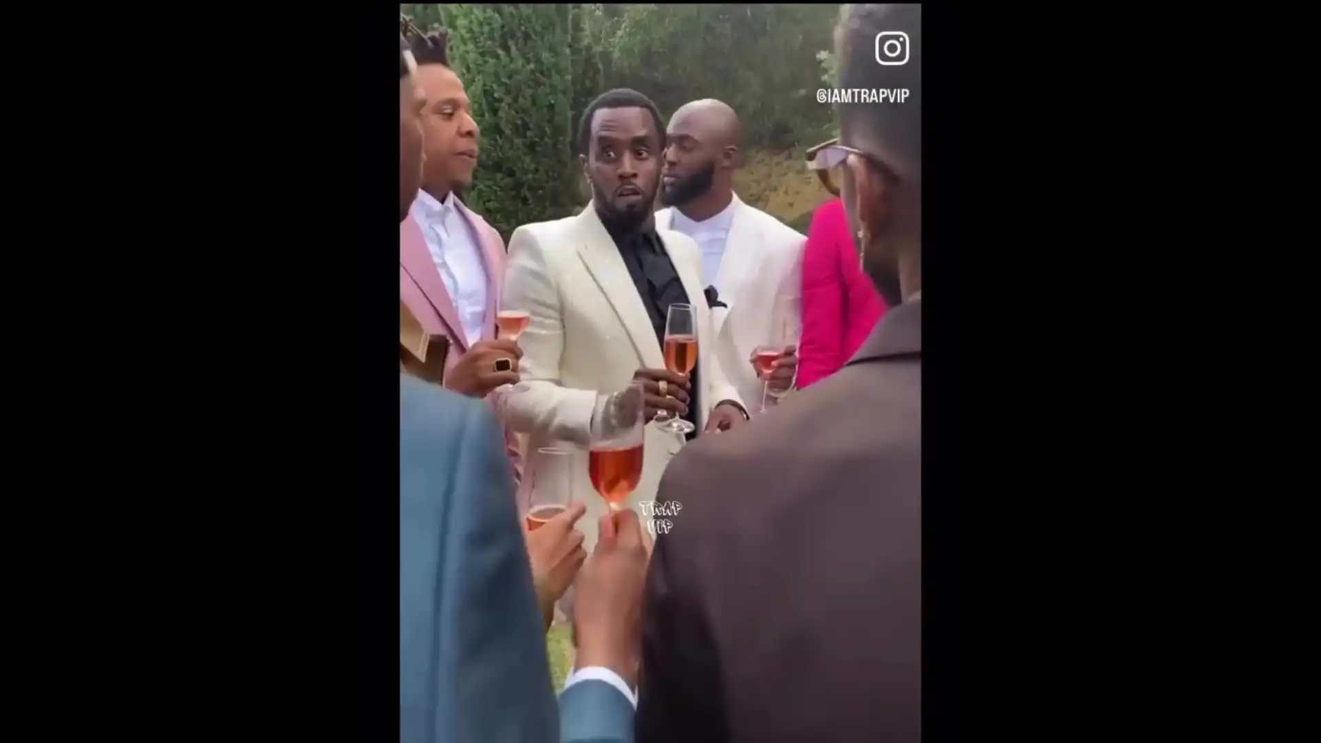 P Diddy giving a toast