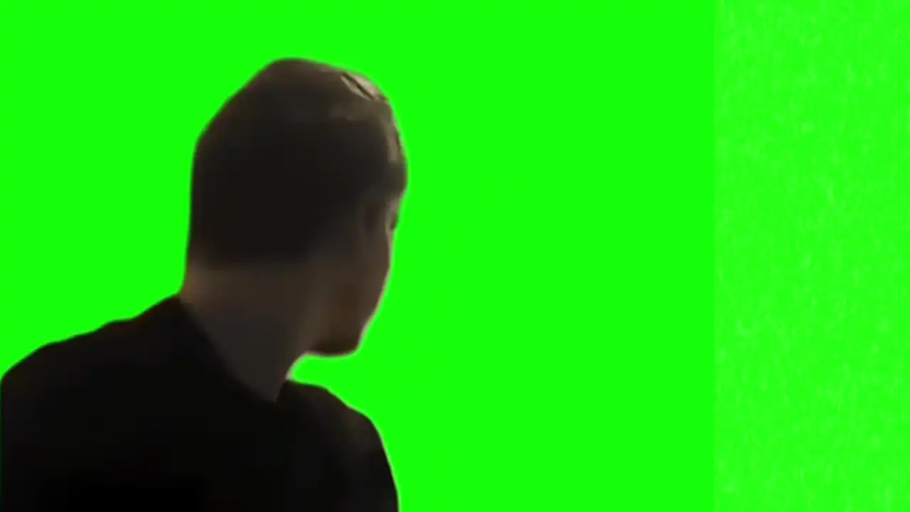 Thomas answering with Ya Meme green screen
