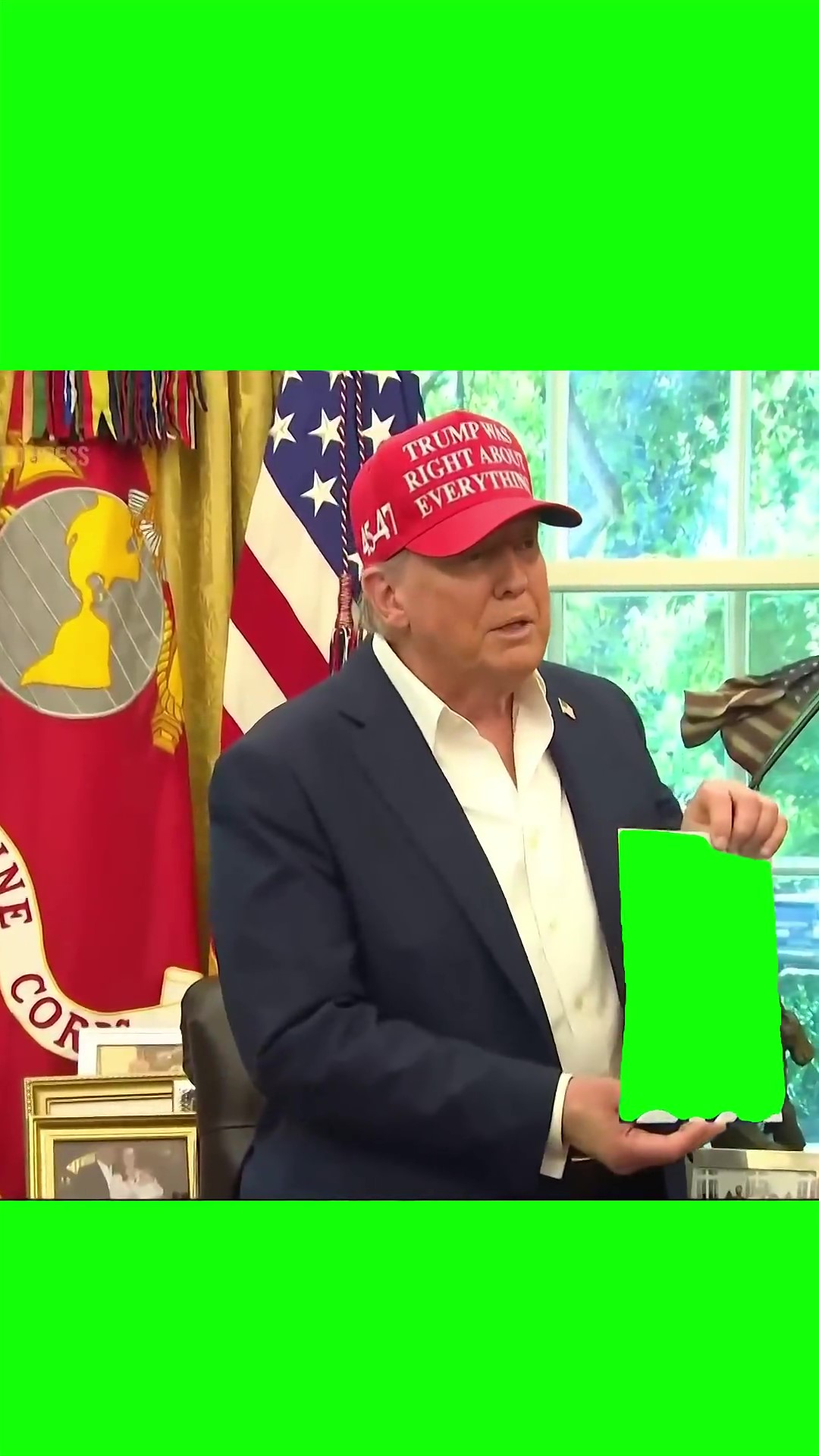 Trump holding green screen